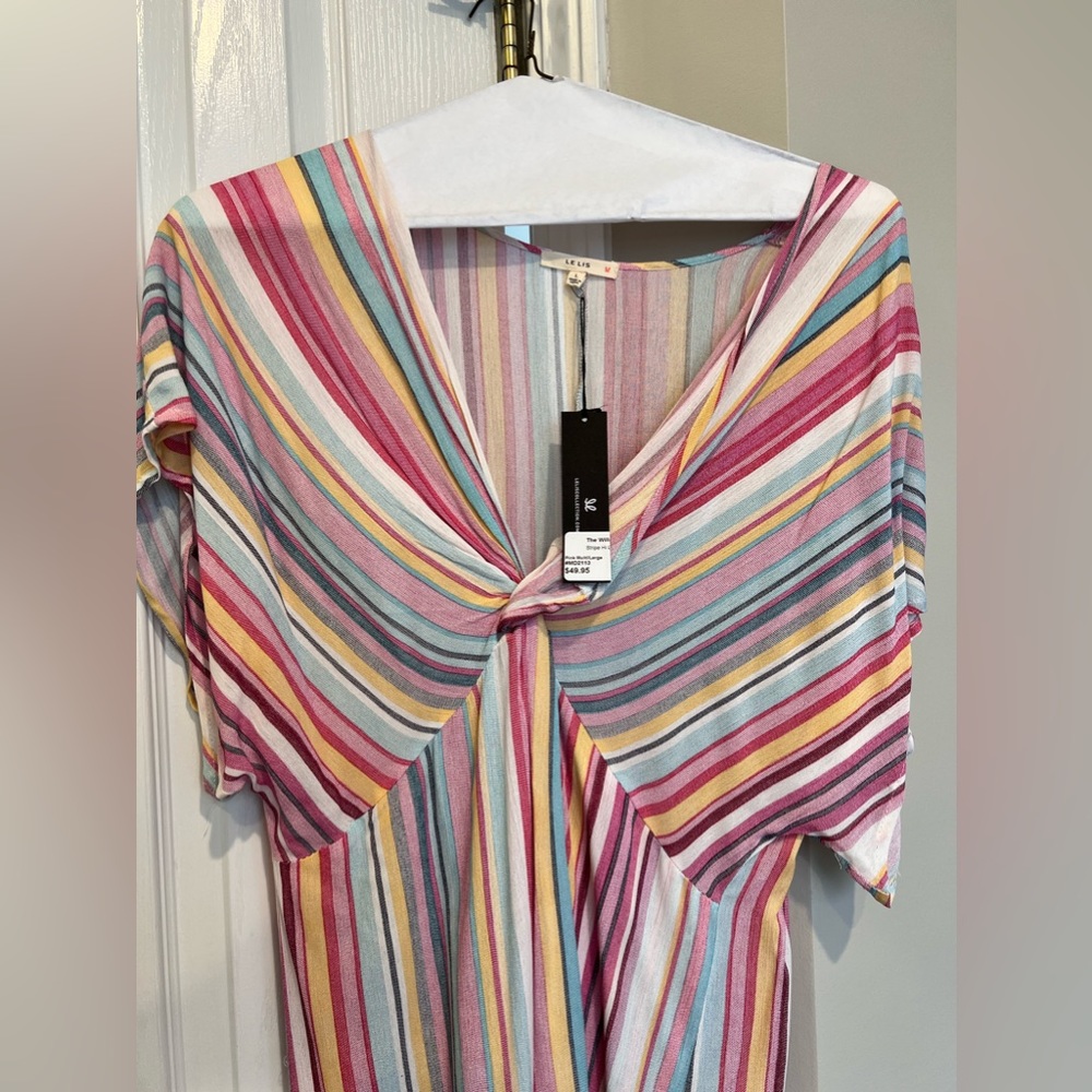 Brand new with tags hi-low dress.  Great for spring or summer wedding invite.